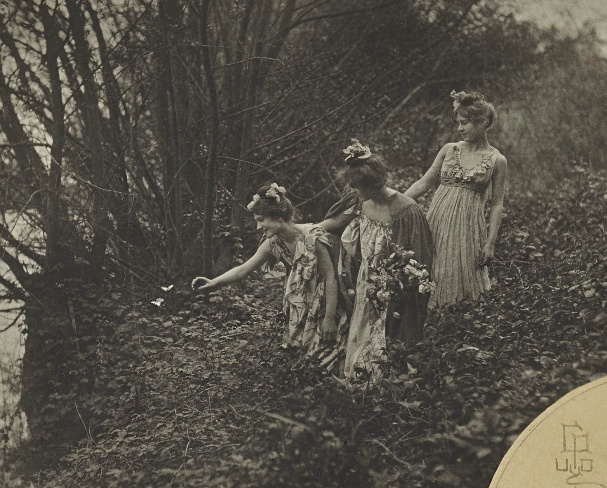 Émile Joachim Constant Puyo :: 'Les Papillons Blancs', 1900. Platinum print with trimmed decorative corners, mounted to cream paper, the photographer's stylized signature in ink and his blindstamp on the mount. | src Sotheby's [detail]