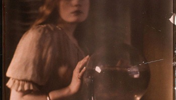Flo Peterson feeding the red fish, autochrome
